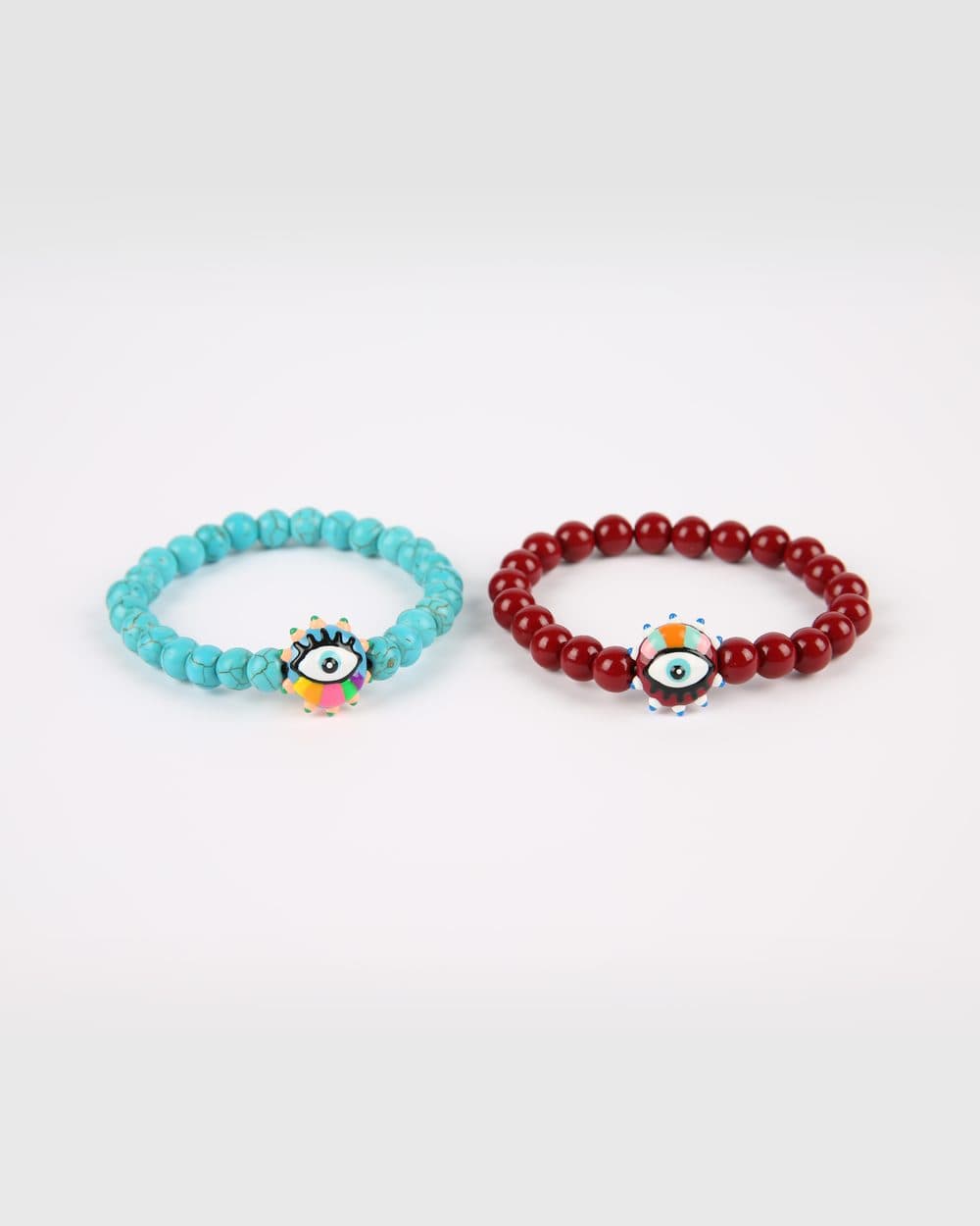Pulsera turquesa y pulsera roja