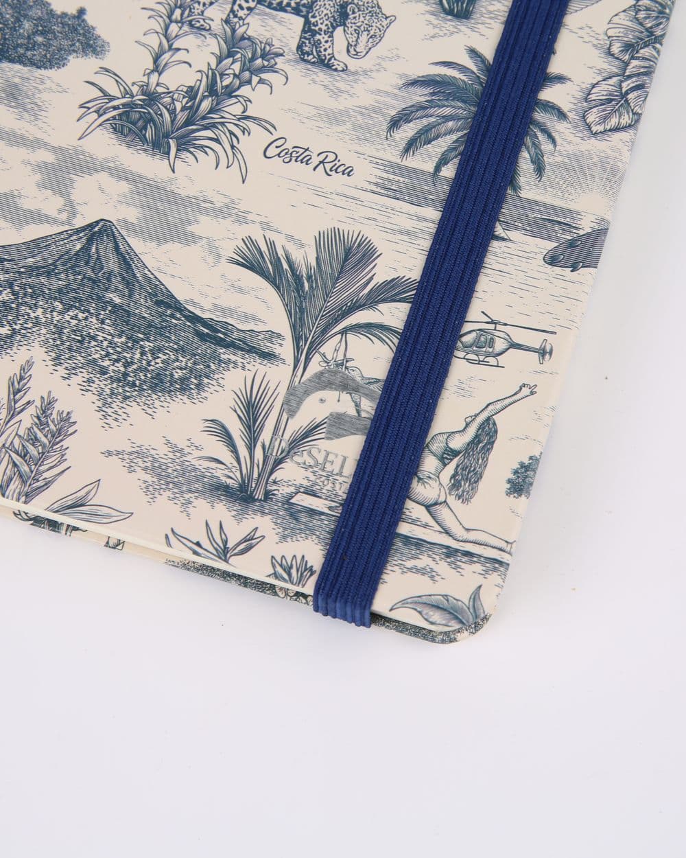 Estampado azul de la libreta con volcán y palmeras